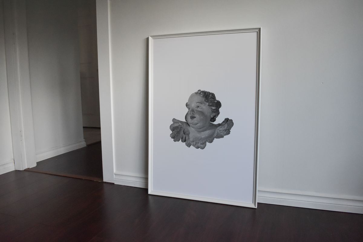 Concrete Angel print framed on white wall by Madeline LeBlanc / Making Madi